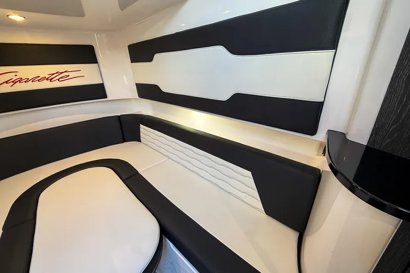  Yacht Photos Pics 2024 Cigarette 42 Auroris interior with sleek black and white seating design.