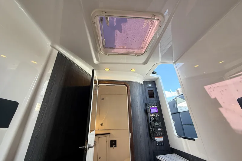  Yacht Photos Pics Interior of 2024 Cigarette 42 Auroris boat, featuring modern design and control panel.