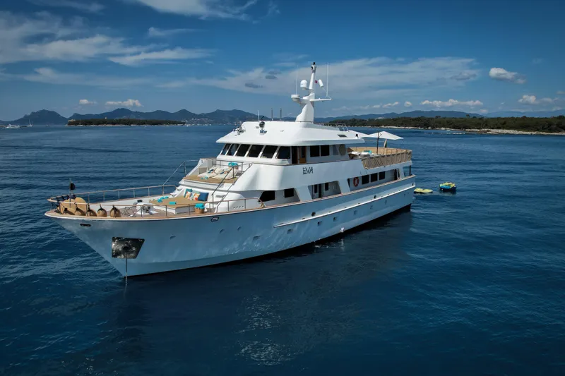 Eva Yacht Photos Pics Luxury 1993 Cheoy Lee Custom yacht on serene blue waters.