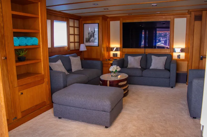 Eva Yacht Photos Pics Luxurious 1993 Cheoy Lee Custom yacht interior with cozy seating and elegant decor.