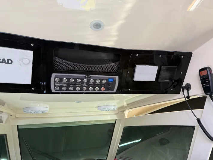  Yacht Photos Pics 2016 Scout 42LXF boat dashboard with control panel and communication devices.