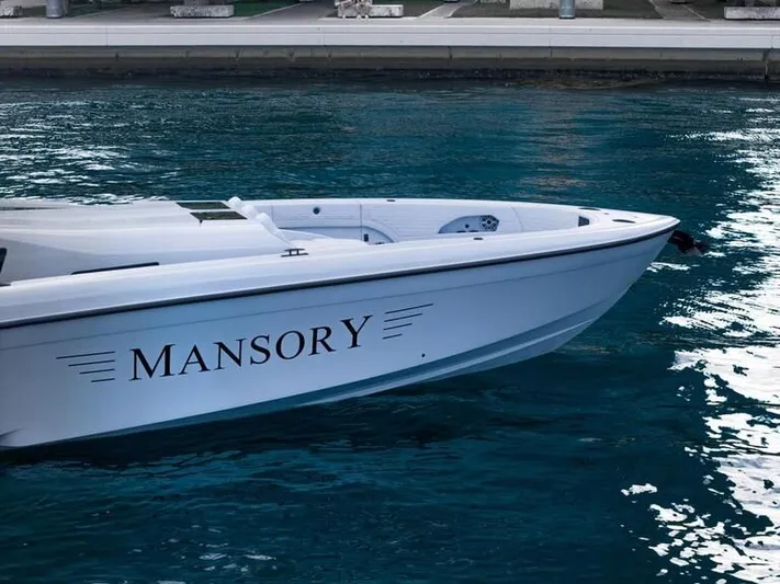  Yacht Photos Pics 2026 Midnight Express 52' Vitesse boat on water, featuring "Mansory" branding.