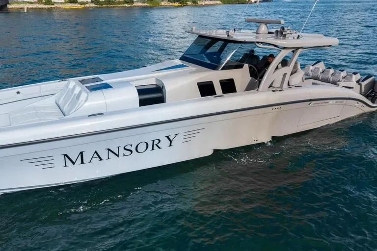  Yacht Photos Pics 2026 Midnight Express 52' Vitesse luxury yacht cruising on blue waters.