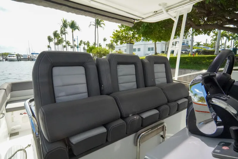  Yacht Photos Pics 2021 Jeanneau Leader 10.5 WA boat interior with sleek seating and modern design.