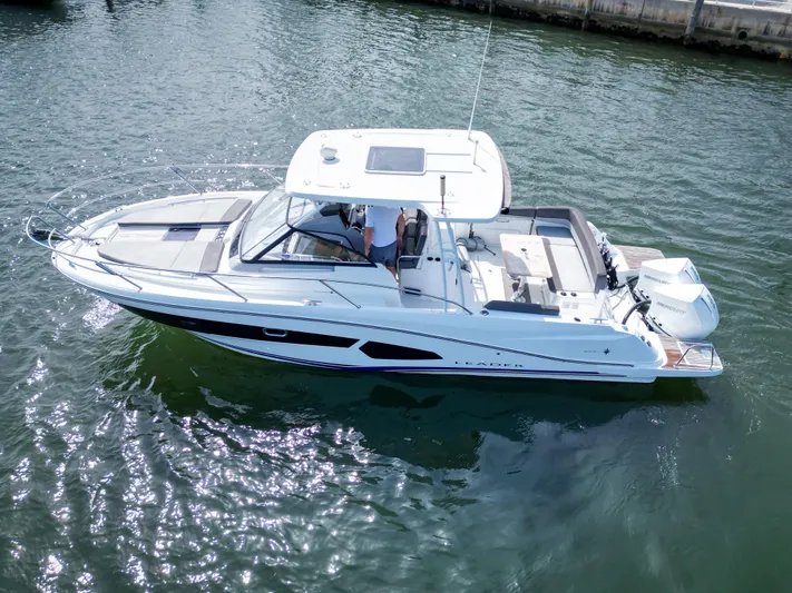  Yacht Photos Pics 2021 Jeanneau Leader 10.5 WA boat on water, aerial view.
