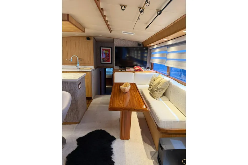  Yacht Photos Pics Luxurious interior of a 1989 Buddy Davis 61 yacht with modern furnishings and decor.