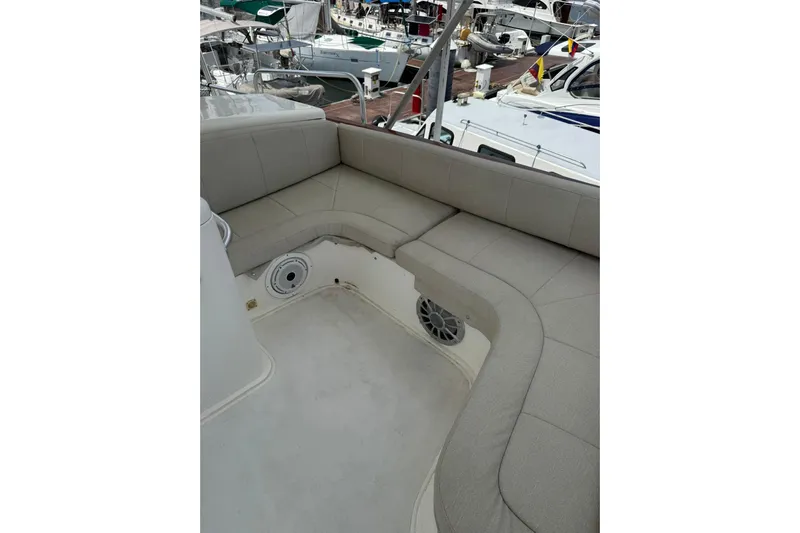  Yacht Photos Pics 1989 Buddy Davis 61 yacht interior with cushioned seating and speaker system.