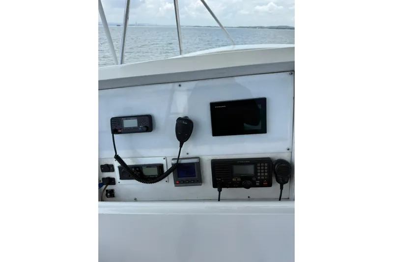  Yacht Photos Pics Control panel of a 1989 Buddy Davis 61 boat with navigation and communication equipment.