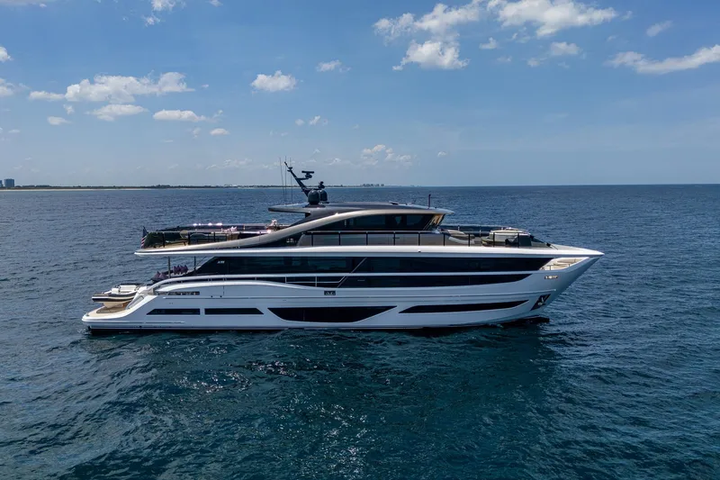 Splash Yacht Photos Pics Luxury 2022 Princess X95 yacht cruising on open sea under clear skies.