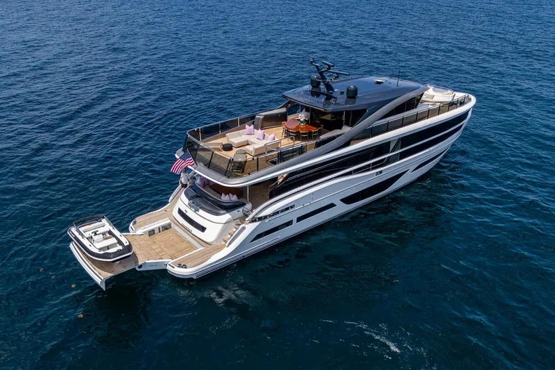 Splash Yacht Photos Pics Luxurious 2022 Princess X95 yacht cruising on open sea, showcasing elegant design.