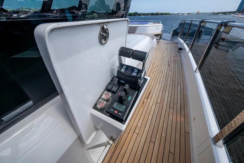 Splash Yacht Photos Pics Control panel on 2022 Princess X95 yacht deck, overlooking water.