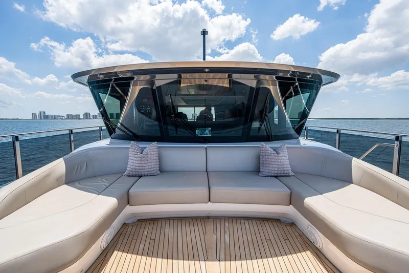 Splash Yacht Photos Pics Luxurious 2022 Princess X95 yacht deck with plush seating and ocean view.