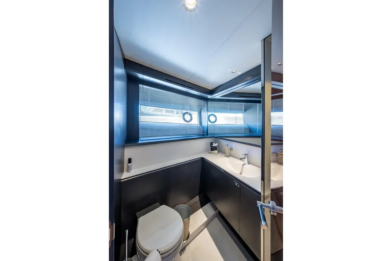 Splash Yacht Photos Pics Luxurious bathroom in 2022 Princess X95 yacht with modern fixtures and sleek design.