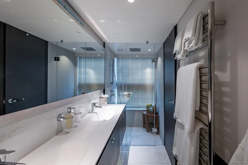 Splash Yacht Photos Pics Luxurious bathroom in 2022 Princess X95 yacht with modern fixtures and elegant design.
