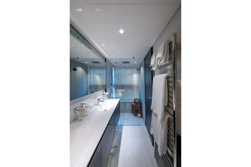 Splash Yacht Photos Pics Luxurious bathroom in 2022 Princess X95 yacht with modern fixtures and elegant design.