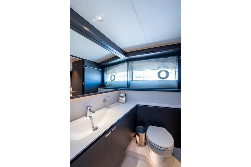 Splash Yacht Photos Pics Luxurious bathroom interior of 2022 Princess X95 yacht with modern fixtures and sleek design.