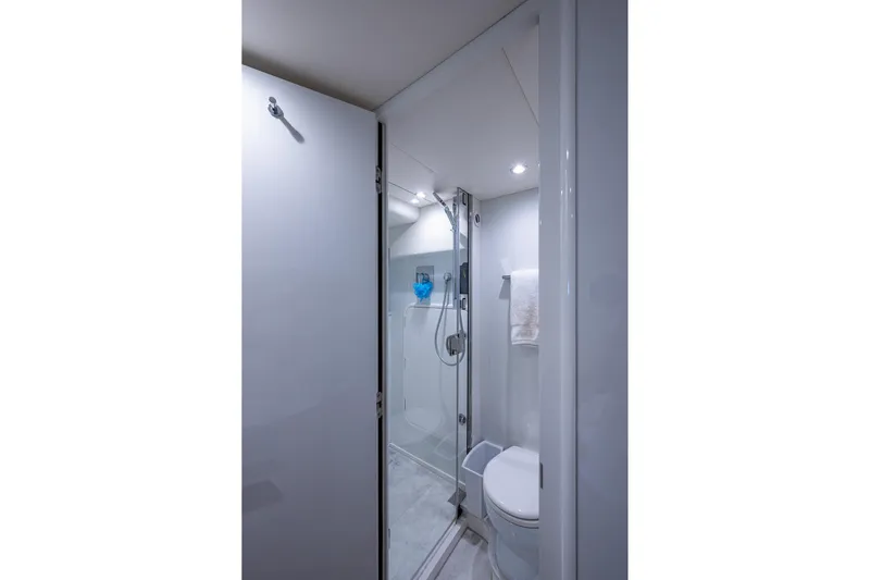 Splash Yacht Photos Pics Luxurious bathroom in 2022 Princess X95 yacht, featuring modern shower and toilet.