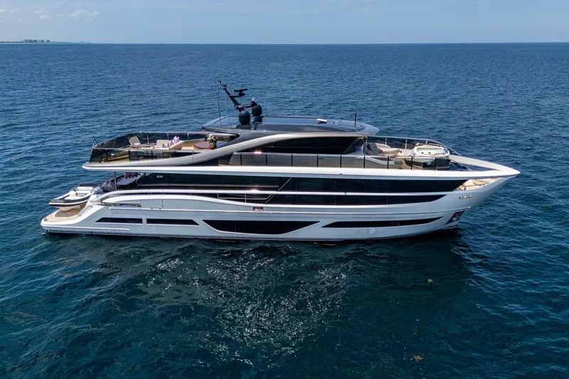 Splash Yacht Photos Pics Luxurious 2022 Princess X95 yacht cruising on open sea, showcasing sleek design and spacious decks.