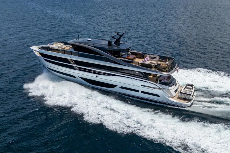 Splash Yacht Photos Pics Luxurious 2022 Princess X95 yacht cruising on open sea, showcasing sleek design and elegance.