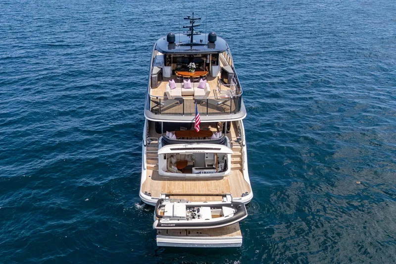 Splash Yacht Photos Pics Luxury 2022 Princess X95 yacht on open sea, showcasing elegant design and spacious decks.