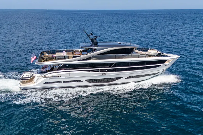 Splash Yacht Photos Pics Luxurious 2022 Princess X95 yacht cruising on open sea, showcasing sleek design and elegance.