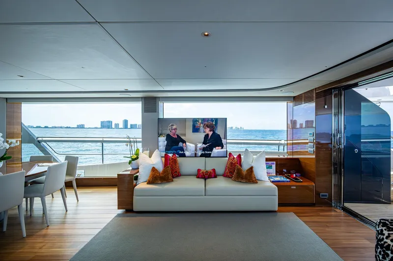 Splash Yacht Photos Pics Luxurious interior of 2022 Princess X95 yacht with ocean view and modern decor.