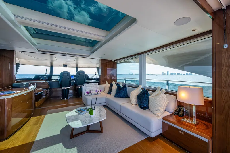 Splash Yacht Photos Pics Luxurious interior of 2022 Princess X95 yacht with ocean view and elegant furnishings.