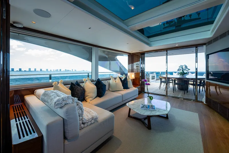 Splash Yacht Photos Pics Luxurious interior of 2022 Princess X95 yacht with ocean view and elegant furnishings.