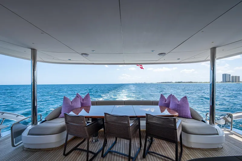 Splash Yacht Photos Pics Luxurious 2022 Princess X95 yacht deck with ocean view and elegant seating.