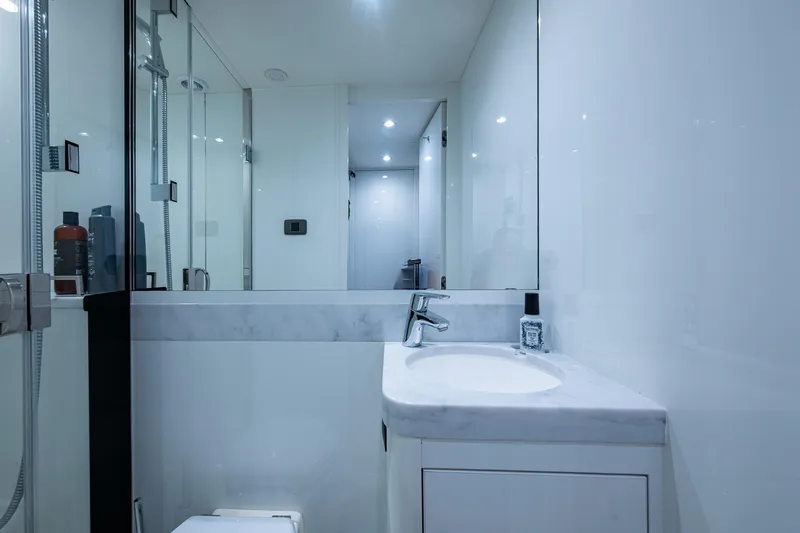 Splash Yacht Photos Pics Luxurious bathroom in 2022 Princess X95 yacht with modern fixtures and sleek design.