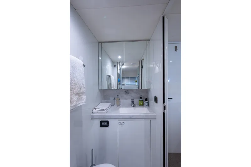 Splash Yacht Photos Pics Luxurious bathroom in 2022 Princess X95 yacht with modern fixtures and elegant design.