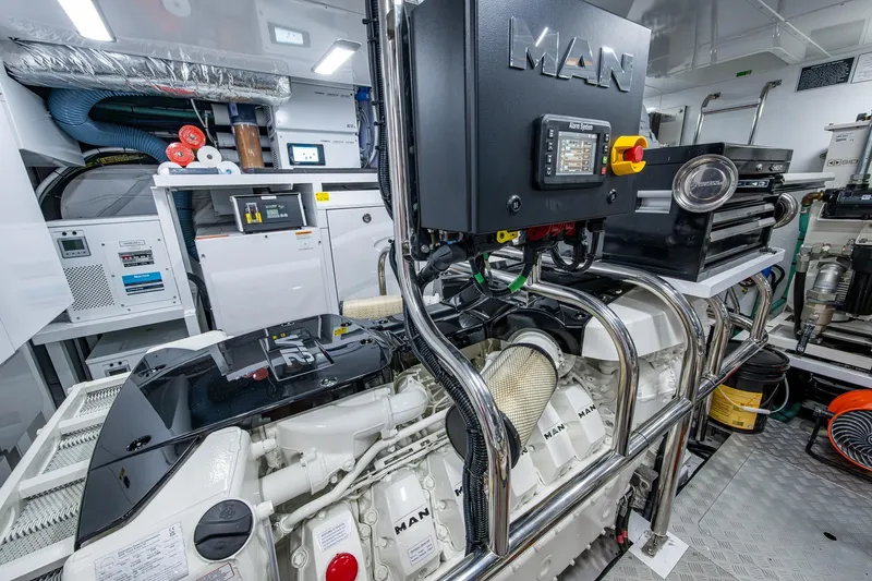 Splash Yacht Photos Pics Engine room of 2022 Princess X95 yacht featuring MAN engine components.