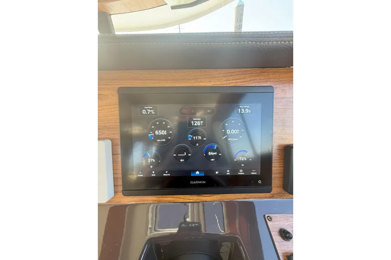 Anima Gemella Yacht Photos Pics Garmin display on 2023 Ranger Tugs R-27 boat dashboard showing engine metrics.