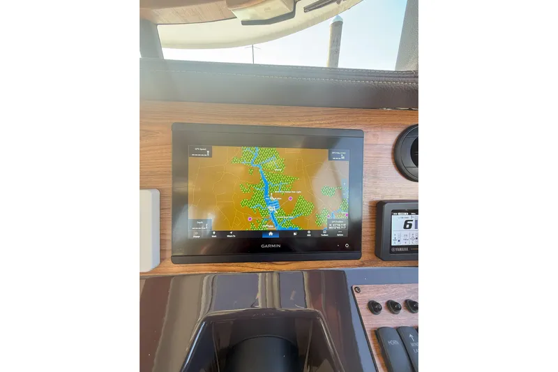 Anima Gemella Yacht Photos Pics 2023 Ranger Tugs R-27 dashboard with Garmin navigation display.