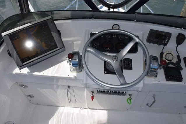 Rampage Yacht Photos Pics Edson helm wheel, Morse single lever controls, compass