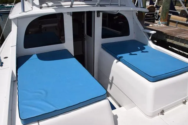 Rampage Yacht Photos Pics Great cruising lounges, cushions on engine boxes