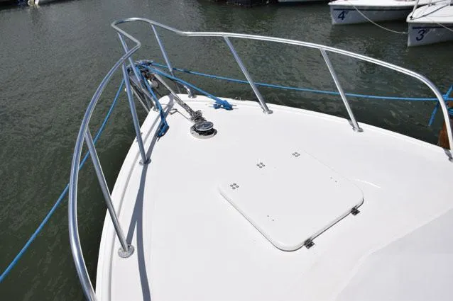Rampage Yacht Photos Pics Aluminum bow rail and solid fiberglass deck hatch