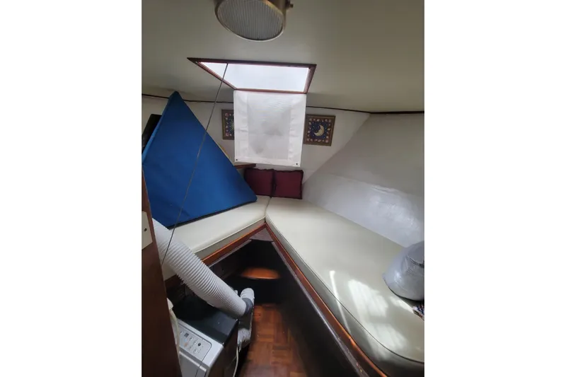  Yacht Photos Pics 1982 Cheoy Lee 52 yacht interior with cozy cabin and skylight.