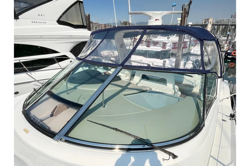  Yacht Photos Pics 2004 Searay 420 Sundancer yacht with clear canopy and sleek design, docked at marina.