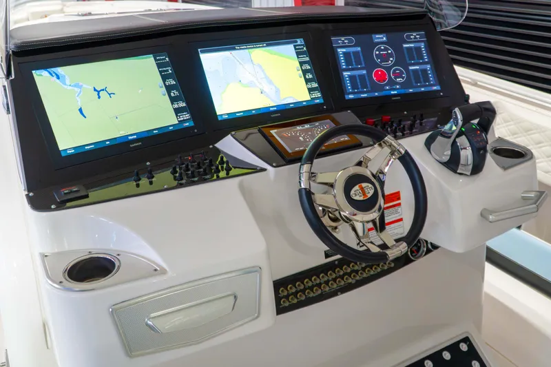  Yacht Photos Pics 2019 Cigarette 41' Nighthawk SD Edition dashboard with advanced navigation displays and controls.