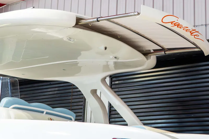  Yacht Photos Pics 2019 Cigarette 41' Nighthawk SD Edition boat with sleek design and branding.