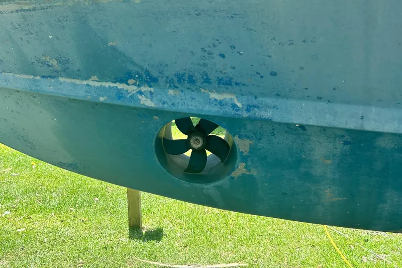  Yacht Photos Pics 2020 Grady-White Freedom 307 boat hull with visible propeller detail.