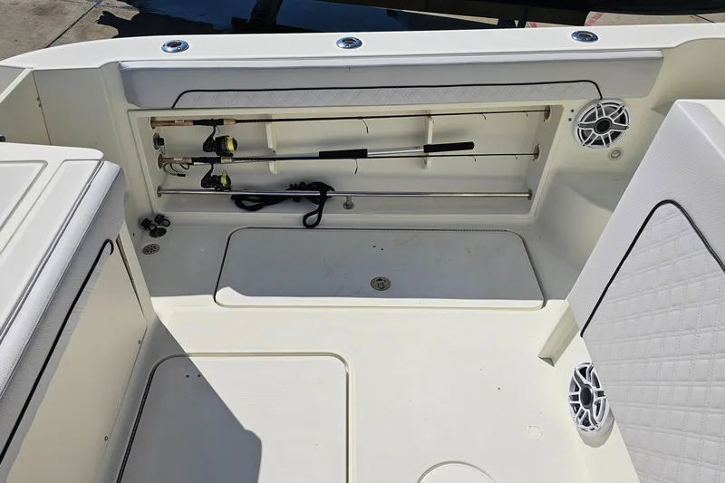  Yacht Photos Pics 2008 Hydra-Sports Vector 3500 VX boat interior with fishing rod storage and speakers.