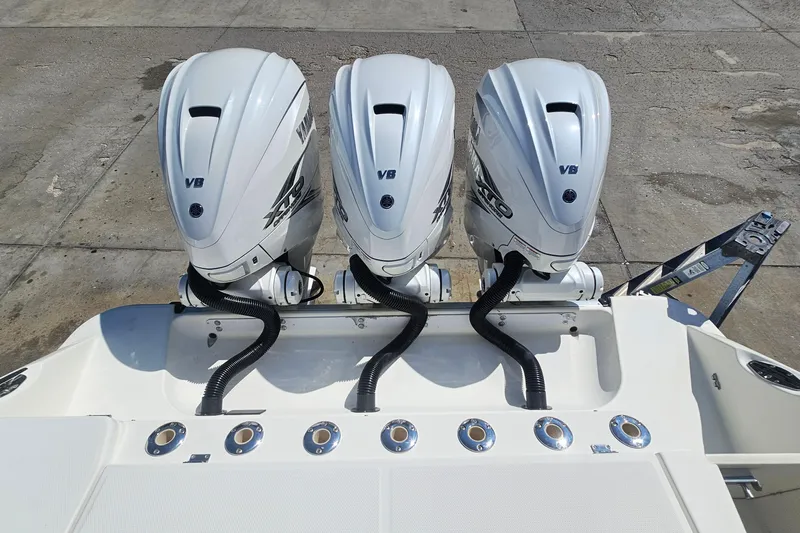  Yacht Photos Pics Triple outboard engines on a 2008 Hydra-Sports Vector 3500 VX boat.
