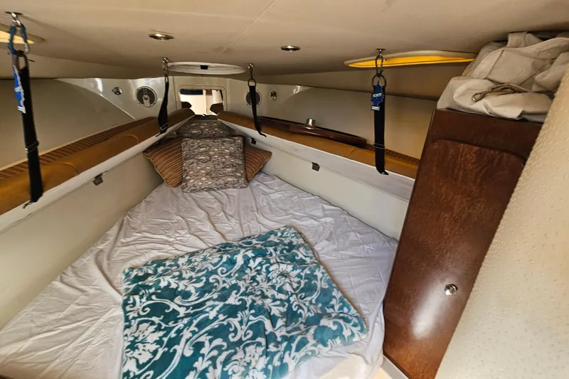  Yacht Photos Pics 2008 Hydra-Sports Vector 3500 VX cabin interior with bedding and storage.