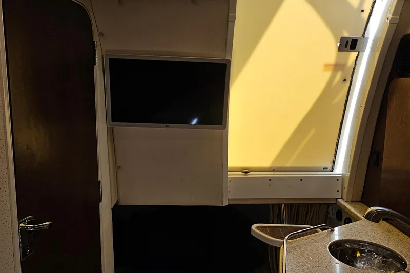  Yacht Photos Pics Interior of 2008 Hydra-Sports Vector 3500 VX boat with TV and kitchenette.