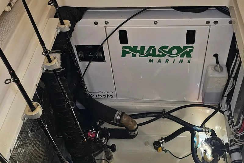  Yacht Photos Pics Engine compartment of 2008 Hydra-Sports Vector 3500 VX with Phasor Marine generator.