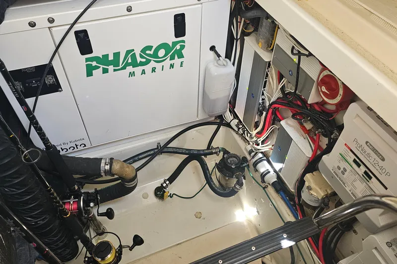  Yacht Photos Pics Engine compartment of 2008 Hydra-Sports Vector 3500 VX with Phasor Marine generator.