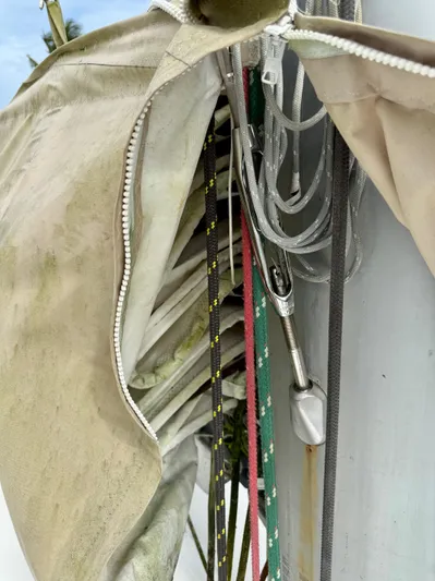 Road Less Travelled Yacht Photos Pics Close-up of a 2013 Lagoon 421 sailboat mast with ropes and sail cover.