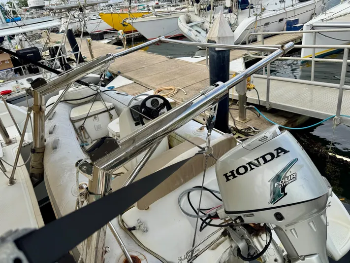 Road Less Travelled Yacht Photos Pics Docked Lagoon 421 catamaran with Honda outboard motor, 2013 model, at marina.